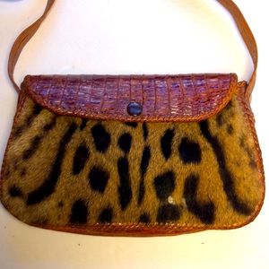 Ocelot purse handmade vintage from world travels adjustable strap leather